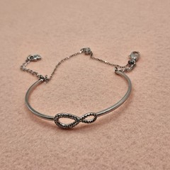 Swarovski Infinity Bangle Bracelet Adorned White Crystals Rhodium Plated Signed