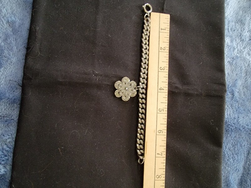 Silver Colored Bracelet With Flower Charm gallery