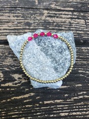 Gold-toned Pink Bicone Beaded Bracelet.