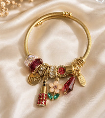 Gold Tone Charm Bangle Bracelet w/ Love & Flower Dangle Red Green Crystals