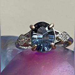 Handmade. Elegant Blue Mystic Topaz ring set in adjustable Sterling Silver band.