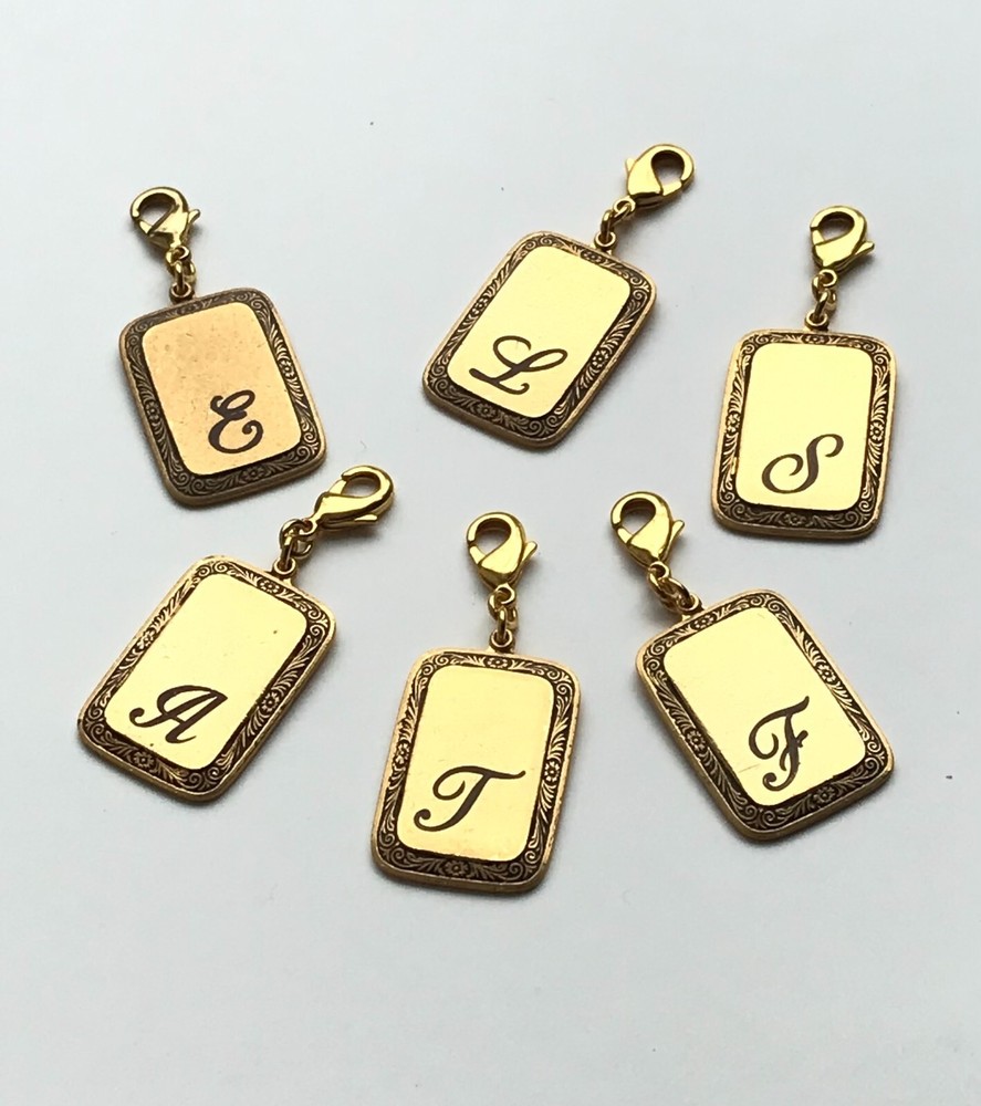 John Wind Charm Dog Tag Initial Charm Gold Maximal Art