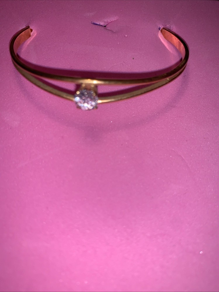 Open Cuff Bangle Bracelet with a single solitaire stone in a prong setting