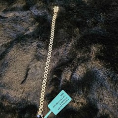 1.87CTW VVSD Moissanite 7″ Cuban Bracelet in .925 sterling silver.