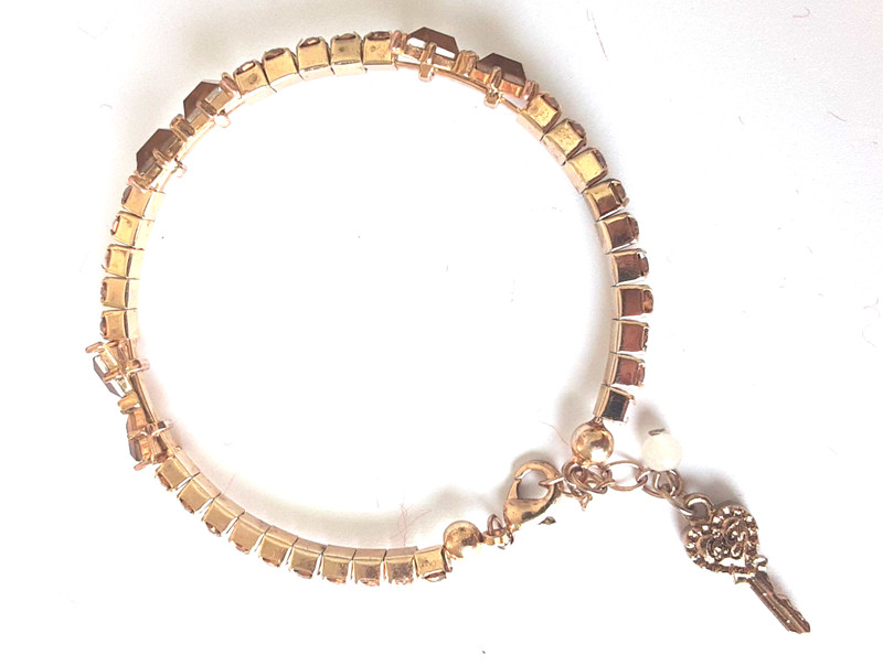 Betsey Johnson Bow Bracelet Bangle Gold 7 to 8 inches gallery