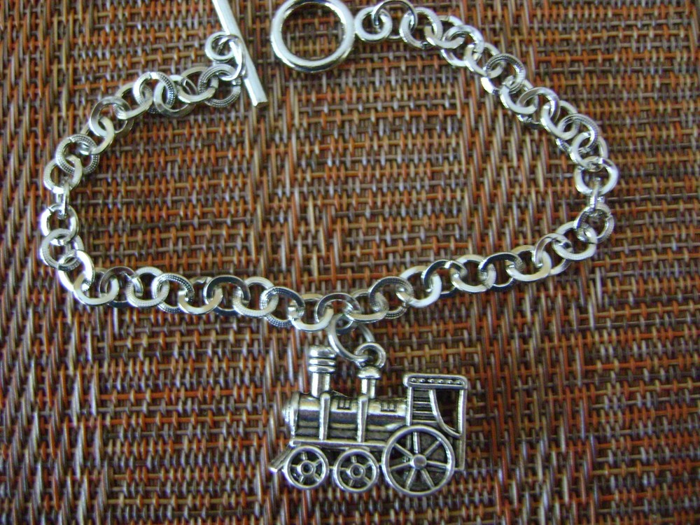 Silver Toggle Bracelet with Train Charm (approximately 7 1/2 inches long)
