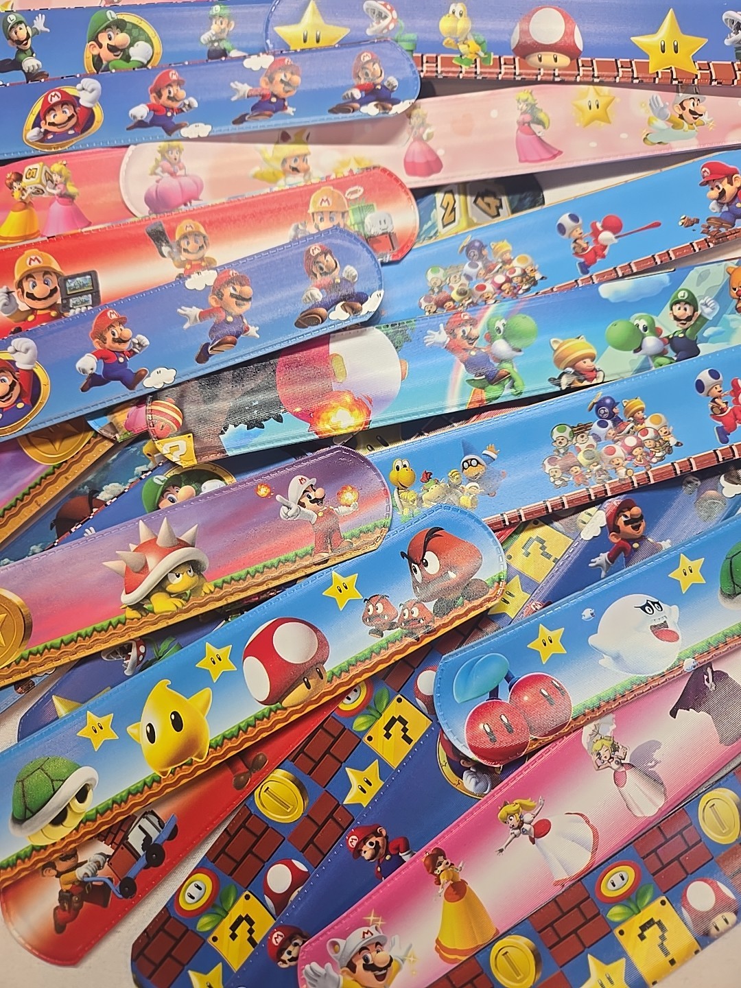 Super Mario Brothers Mixed Slap Band Snap Bracelet 12pc Party Fun Bag Stuffers gallery