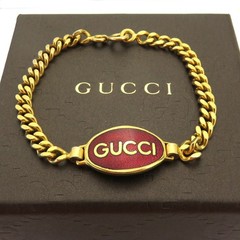 Gucci Vintage Gold Tone Metal Red Oval Tag Bracelet