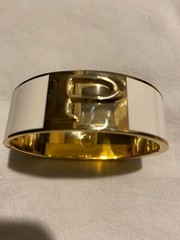Gold & Cream Cuff Bracelet with letter “P” on it