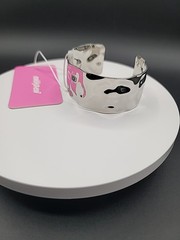 Women’s Ediksted silver cuff bracelet, likely featuring a hammered texture