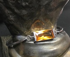 Bracelet, silver tone curved bar links, extension chain, glass gem, Amber-color