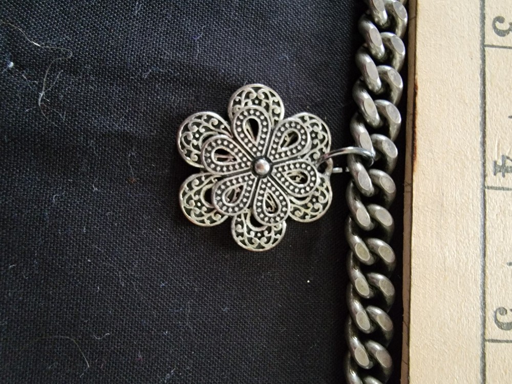Silver Colored Bracelet With Flower Charm