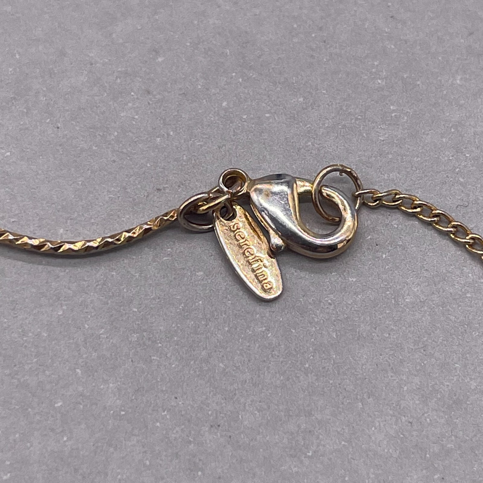 Serefina Triangle Crystal Charm Bracelet Gold Tone 7 Inches gallery