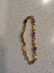 Vintage AVON Gold Tone & Amethyst Infinity Bracelet Spring Ring Fashion Costume