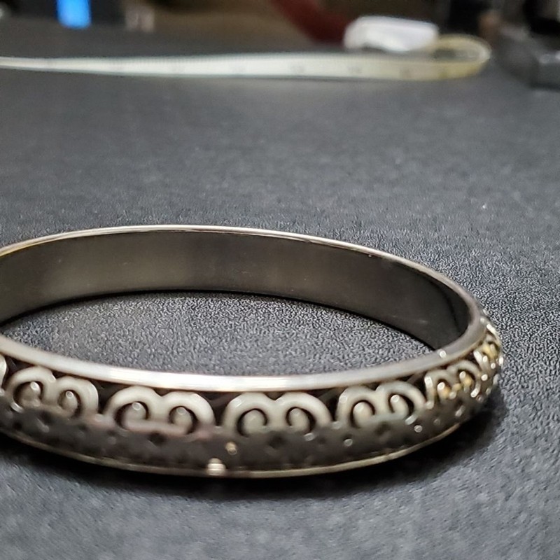 Silver tone filigree bangle bracelet Approx 8" gallery