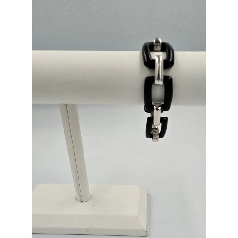 Black and Silver Colored Plastic Bracelet Lightweight and Versatile