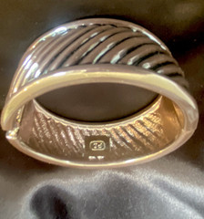 Premier Design spring Bangle. Silver with black undertones.