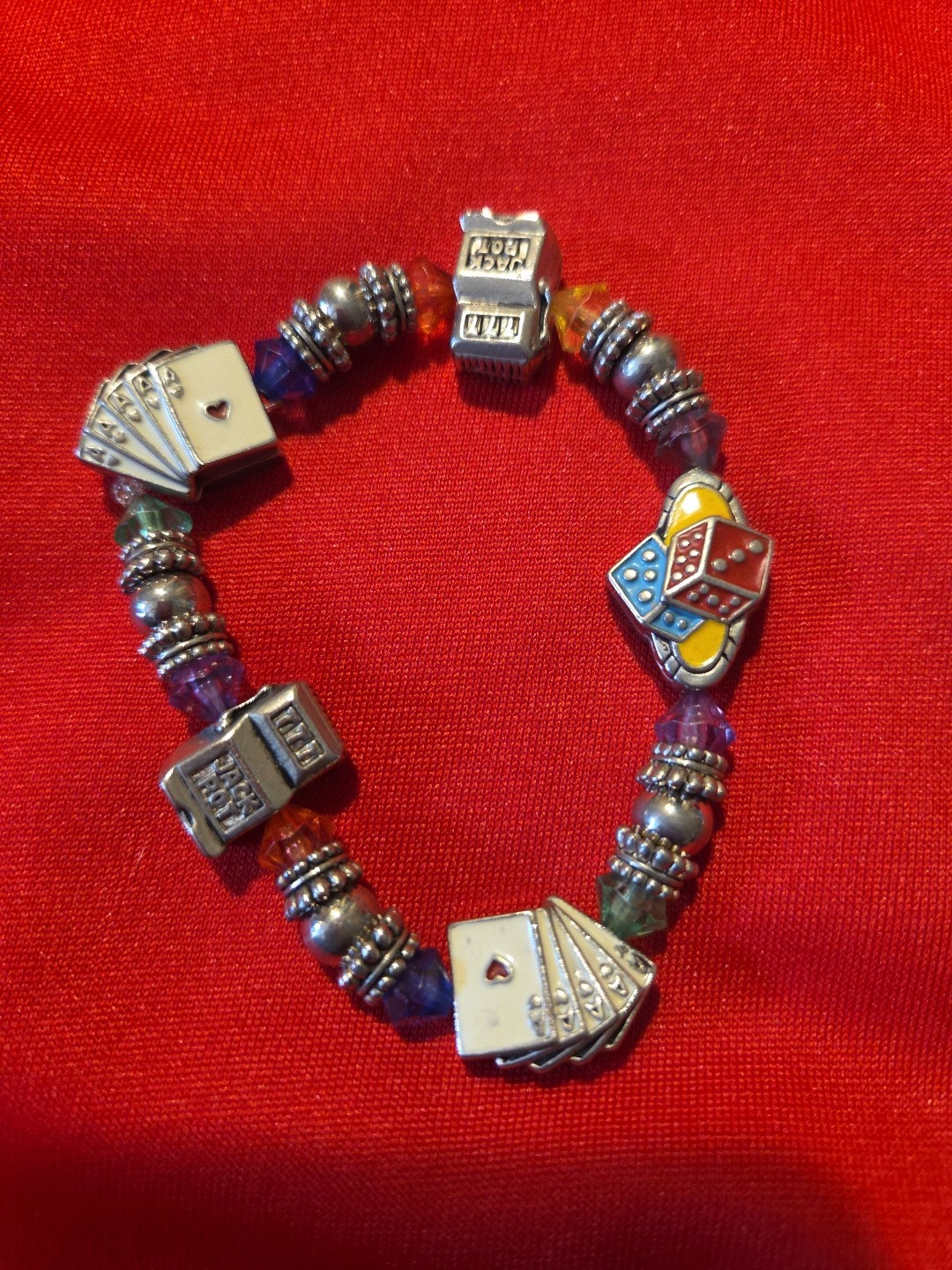 Silver Tone Spring Charm Bracelet With Dice Playing Cards And Slot Machines gallery