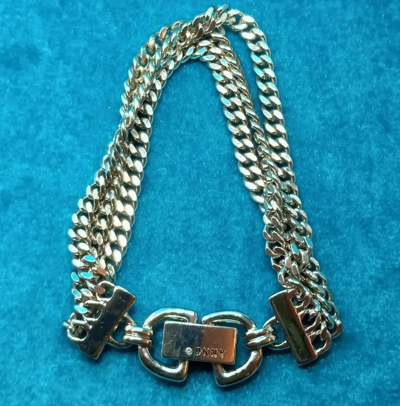 DKNY Gold Tone Triple Chains Bracelet. 1712 gallery