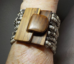 HEMATITE/STONE BEADED MULTI STRAND BRACELET W/WOOD HOOK EYE CLASP