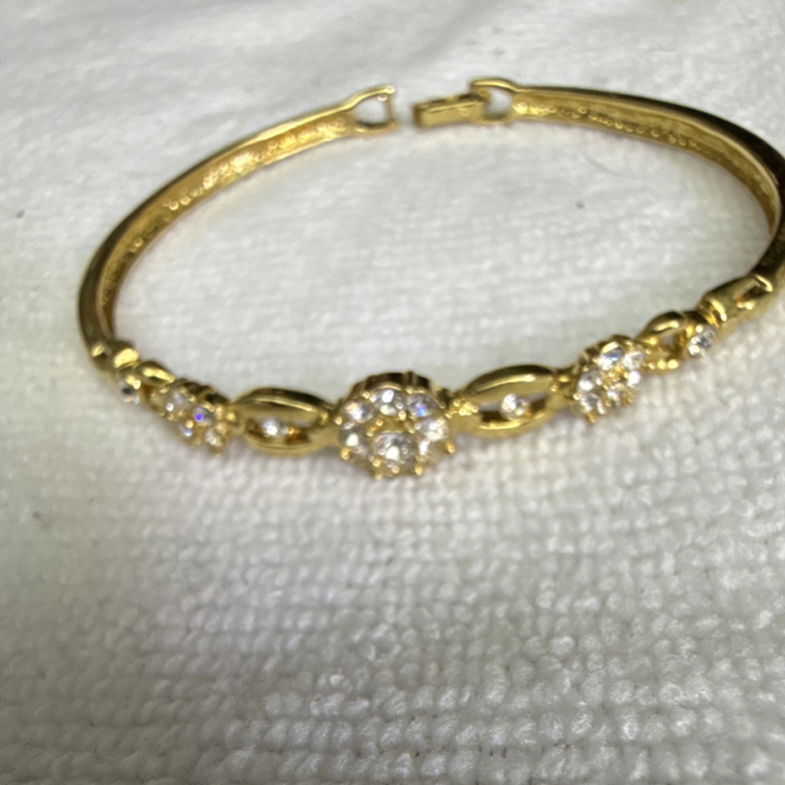 Avon Gold Tone Tennis Bracelet has Round White Crystal Snap Closure 001 gallery
