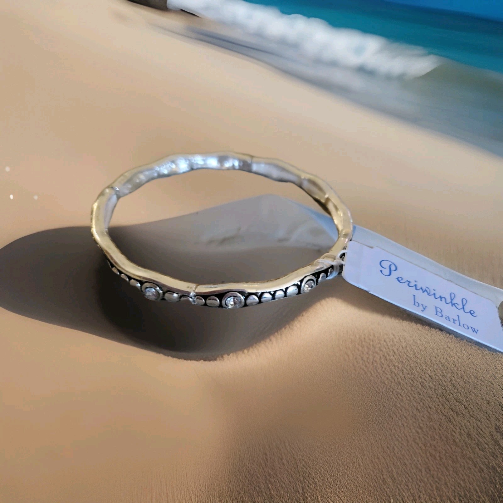 Periwinkle by Barlow Silver-Tone Waved Clear Rhinestone & Bead Bangle Bracelet gallery