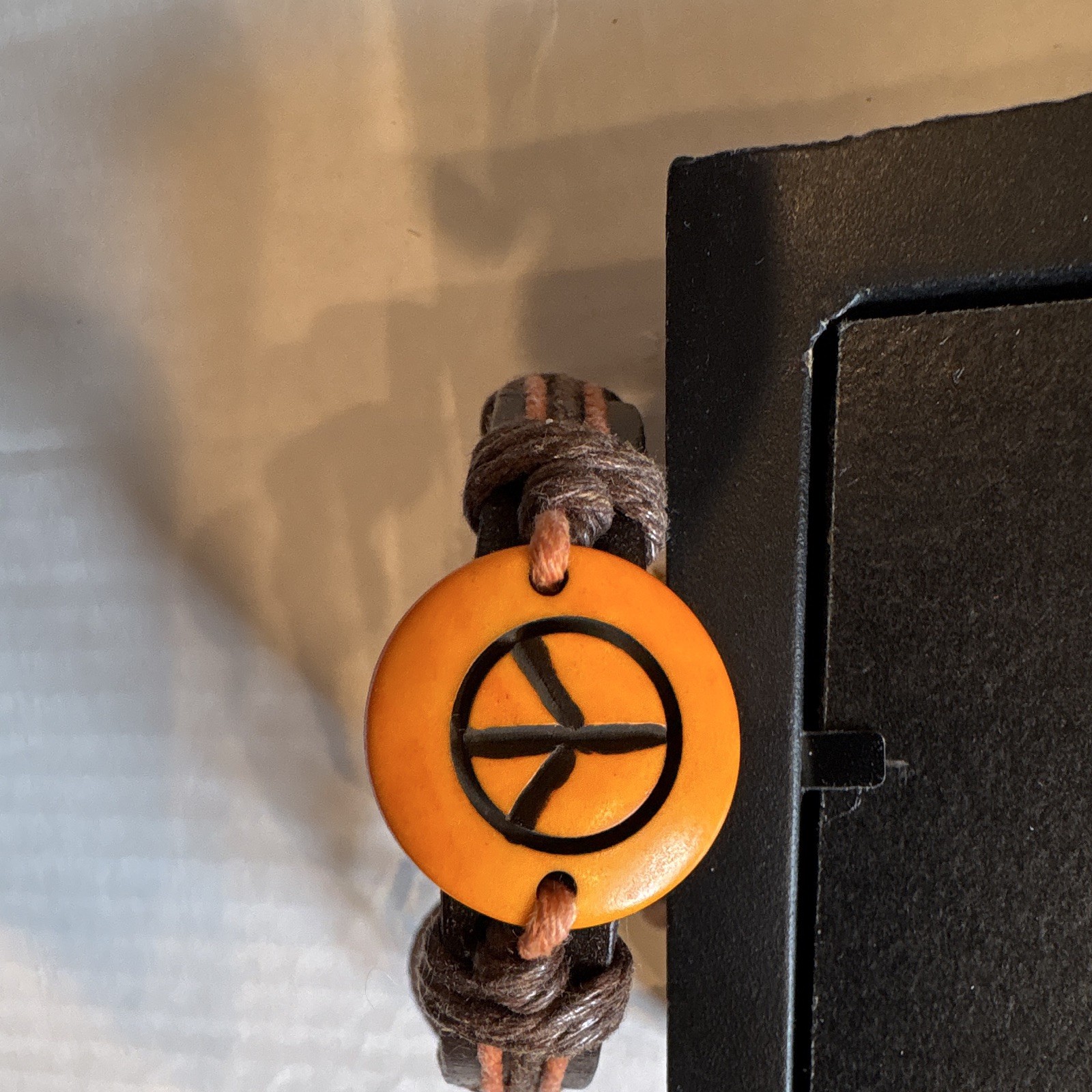 Adjustable Brown Cord Wrap Bracelet w/ Orange Round Peace Dangle Charm gallery