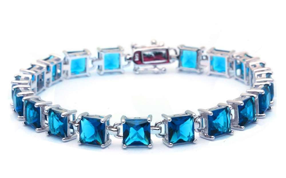 Solitaire 24CT Princess Cut Elegant Blue Topaz .925 Sterling Silver Bracelet