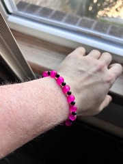 Wood and pink beaded bracelet