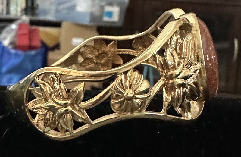 Bracelet - Goldstone Bangle - Bracelet measures 7 inches. The back is open gallery