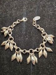 Nicole Miller Silver Tone Charm Bracelet 7″