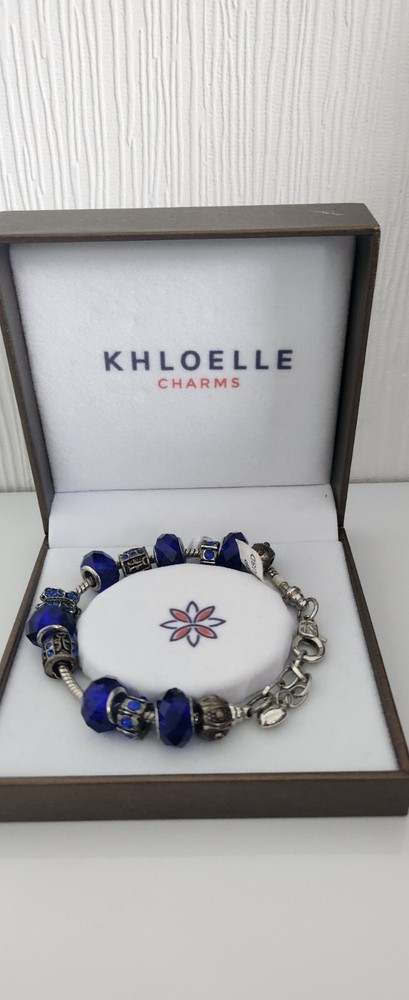 CHARMS bracelet. length 24 cm. new. color silver and blue