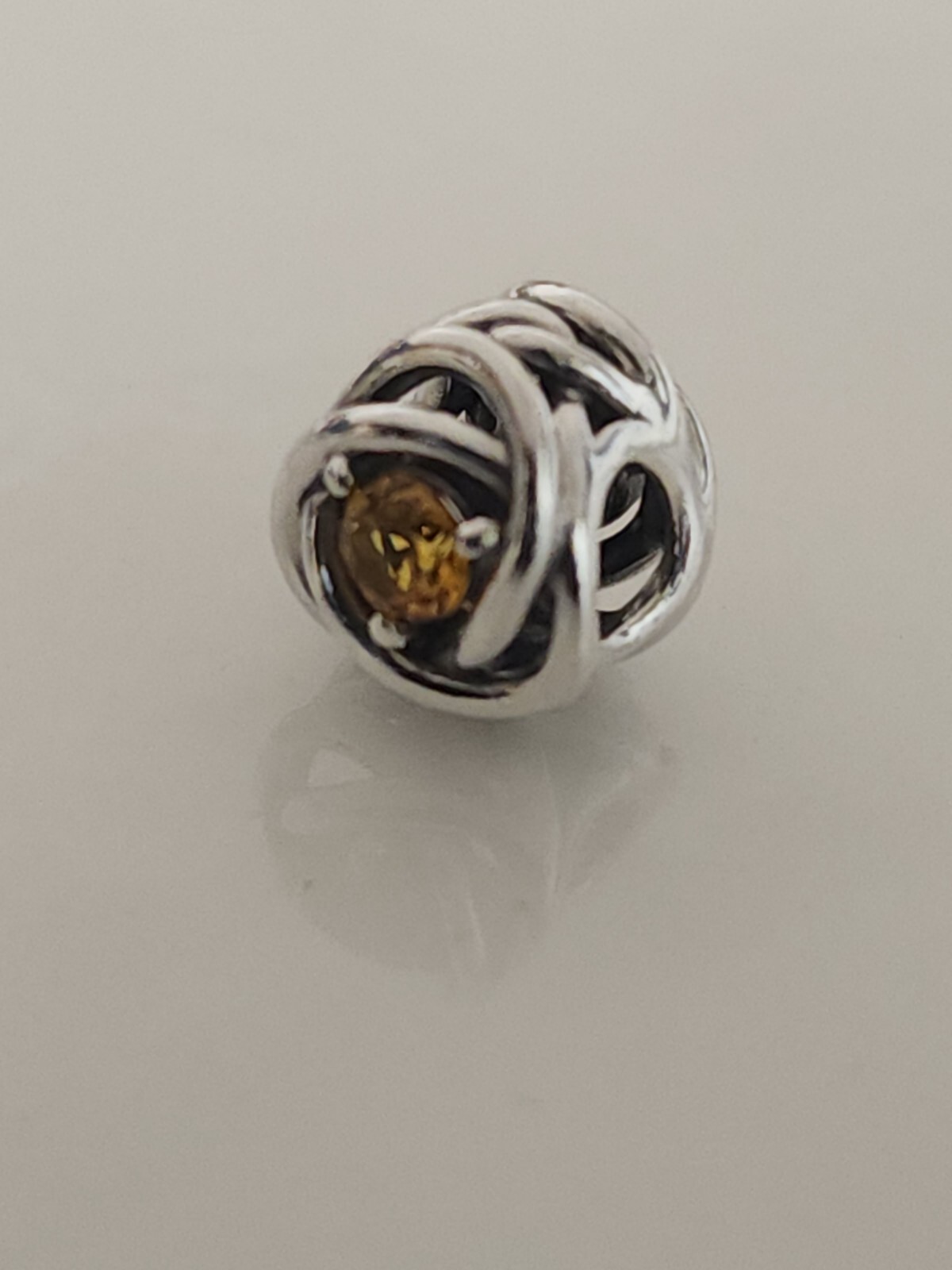 AUTHENTIC PANDORA NOVEMBER HONEY ETERNITY CIRCLE CHARM #790065C04 gallery