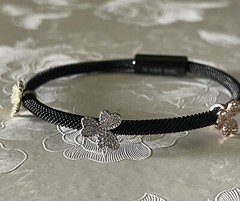 Ladies Black Stainless Steel Wire Bangle With 3 Tone Flower Accents