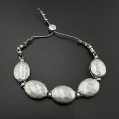 Bella Uno Bracelet Silver Tone Oval Hammered Disc Adjustable Bolo Tie Cord