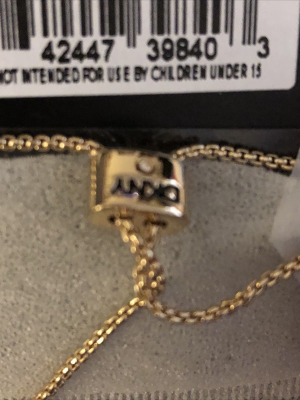 DKNY Gold Tone & Red Crystal Cherry Charm Slider Bracelet NWT gallery