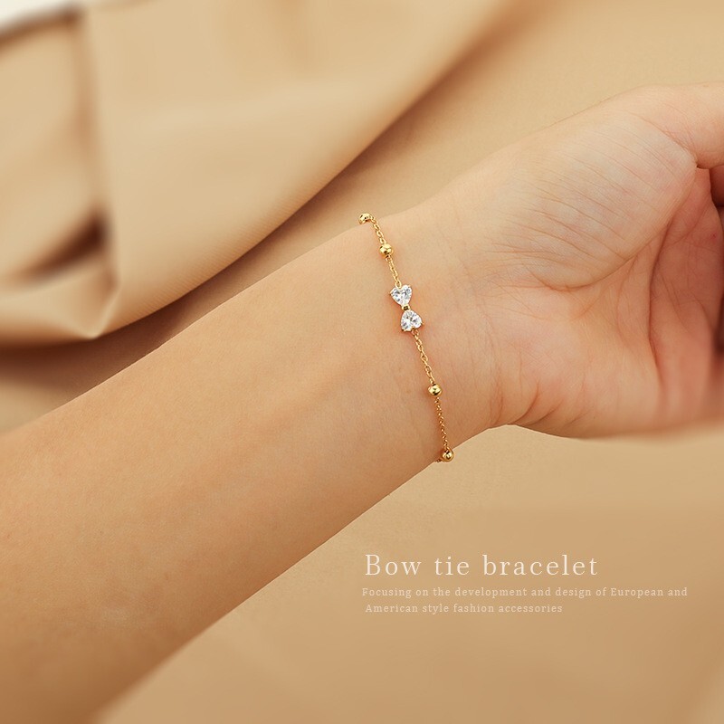 Woman 18K Gold Plated Stainless Steel Station Bead Chain Bowknow CZ Bracelet gallery