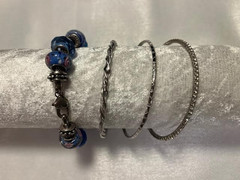 Set 4 Bracelets: 1 Glass/Metal Beaded (9″) and 3 Silver Toned Bracelets