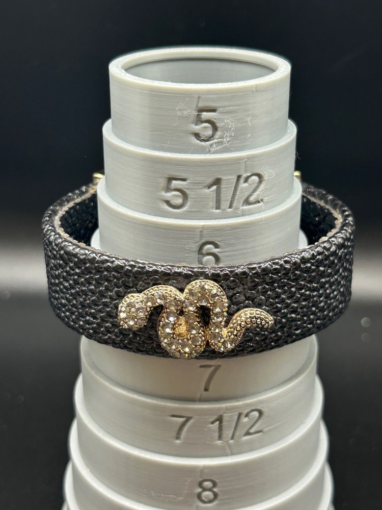 TASHA BLACK CUFF BRACELET WITH SILVERTONE RHINESTONE SNAKE - MARKED AS SHOWN
