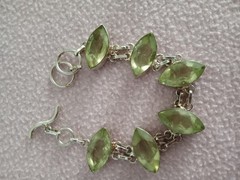 7 inch Bracelet with 5 faceted pale green stones set in silver