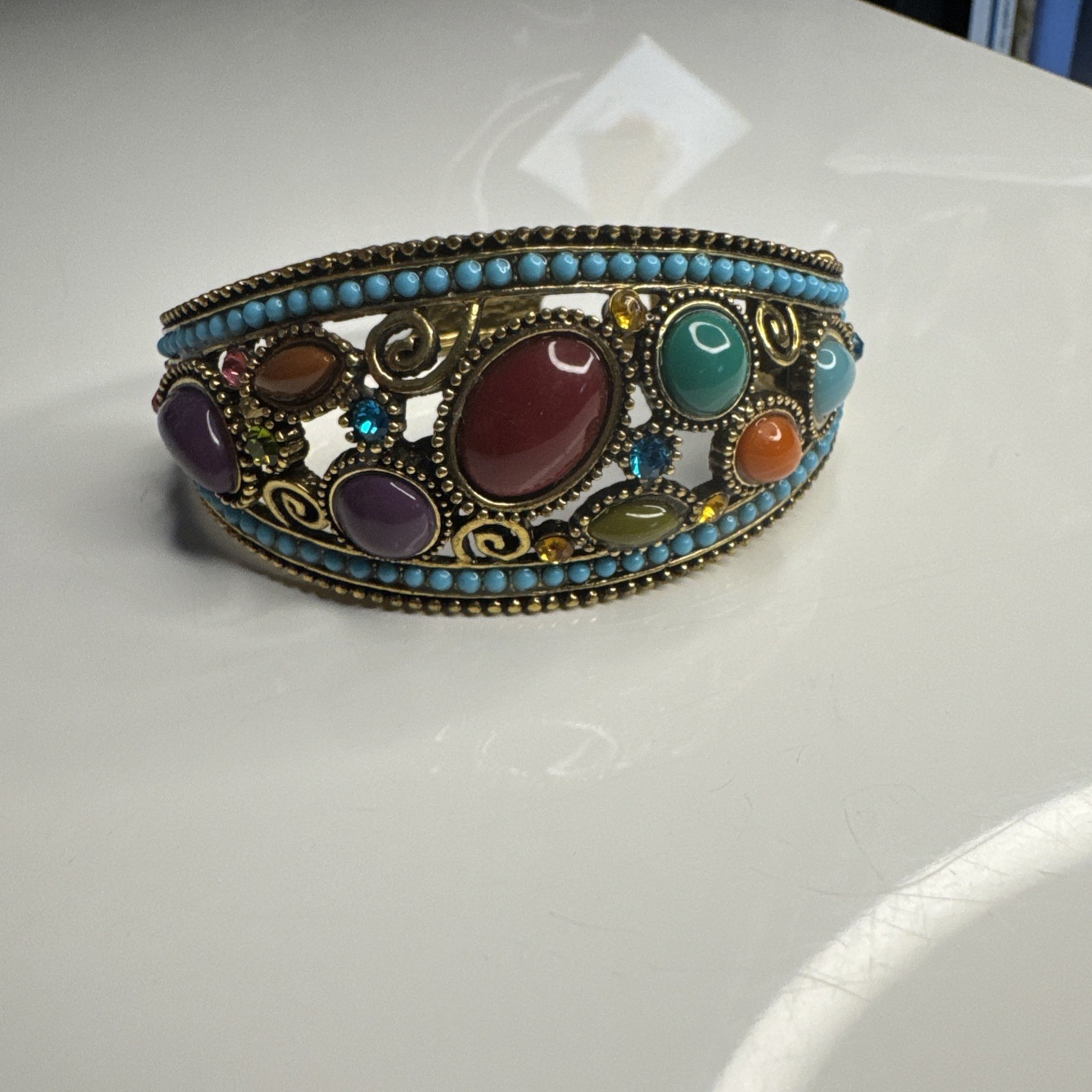 Gorgeous multi color rhinestone on copper tone clamper hinged bracelet by Yuhong gallery