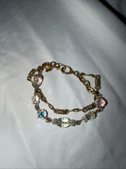 Crystal faceted beads and gold segments adorn this Kirk’s Folly Bracelet