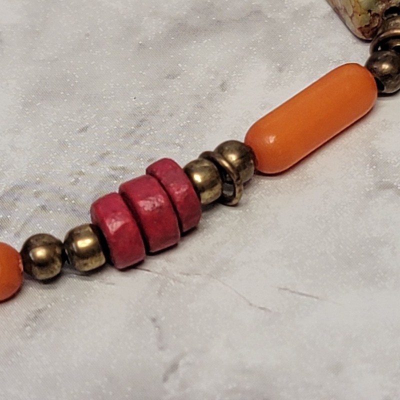 Orange Beaded Bracelet Red Brass Tone Tassel Mottled Rectangular Stretch Boho gallery