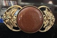 Bracelet – Goldstone Bangle – Bracelet measures 7 inches. The back is open