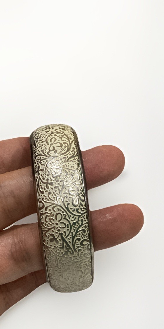Gold Tone Domed Bangle Bracelet With White Enamel Floral Abstract Overlay gallery