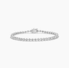 Flower Clasp Tennis Bracelet With 5 CTW simulated Diamonds In 14K White Gold