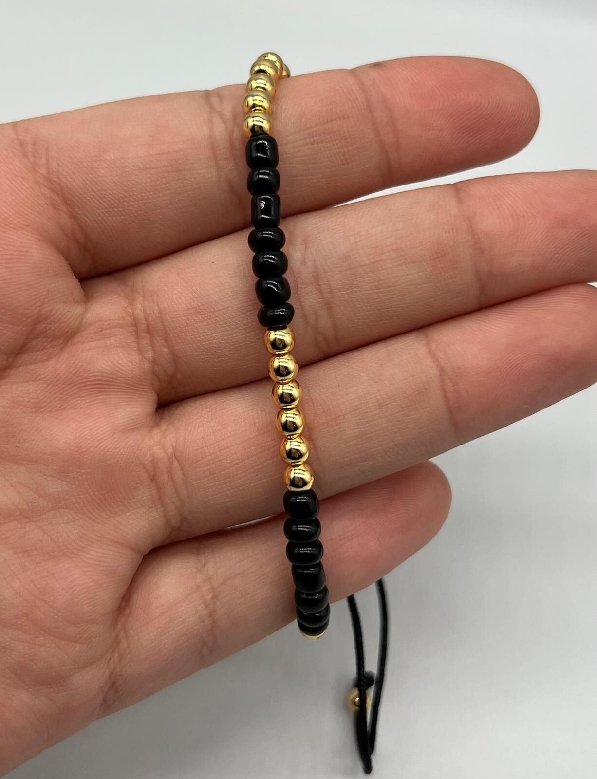 Gold Color Stainless Steel Thread Black Bracelet with Adjustable Beads gallery