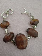 5 Stone Seven inch Bracelet with woodlike stones set in 925 silver