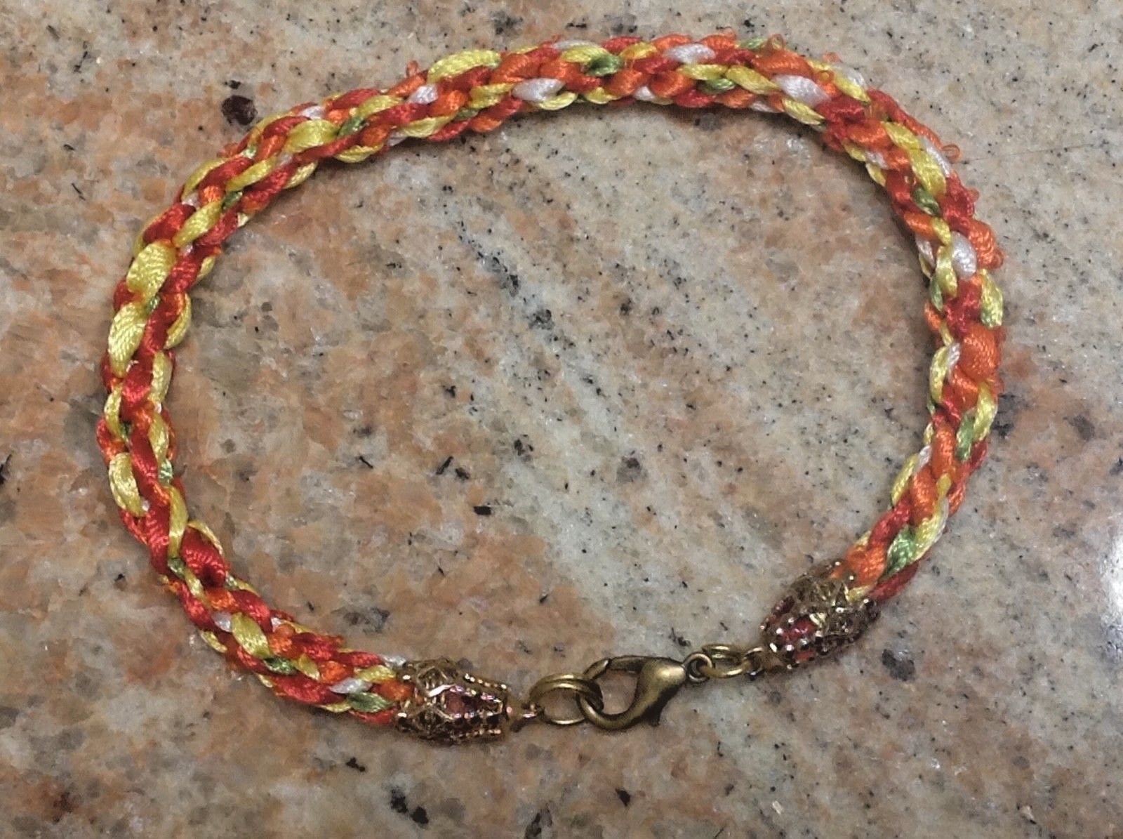Bracelet, Handcrafted Fall colors ribbon weave gallery