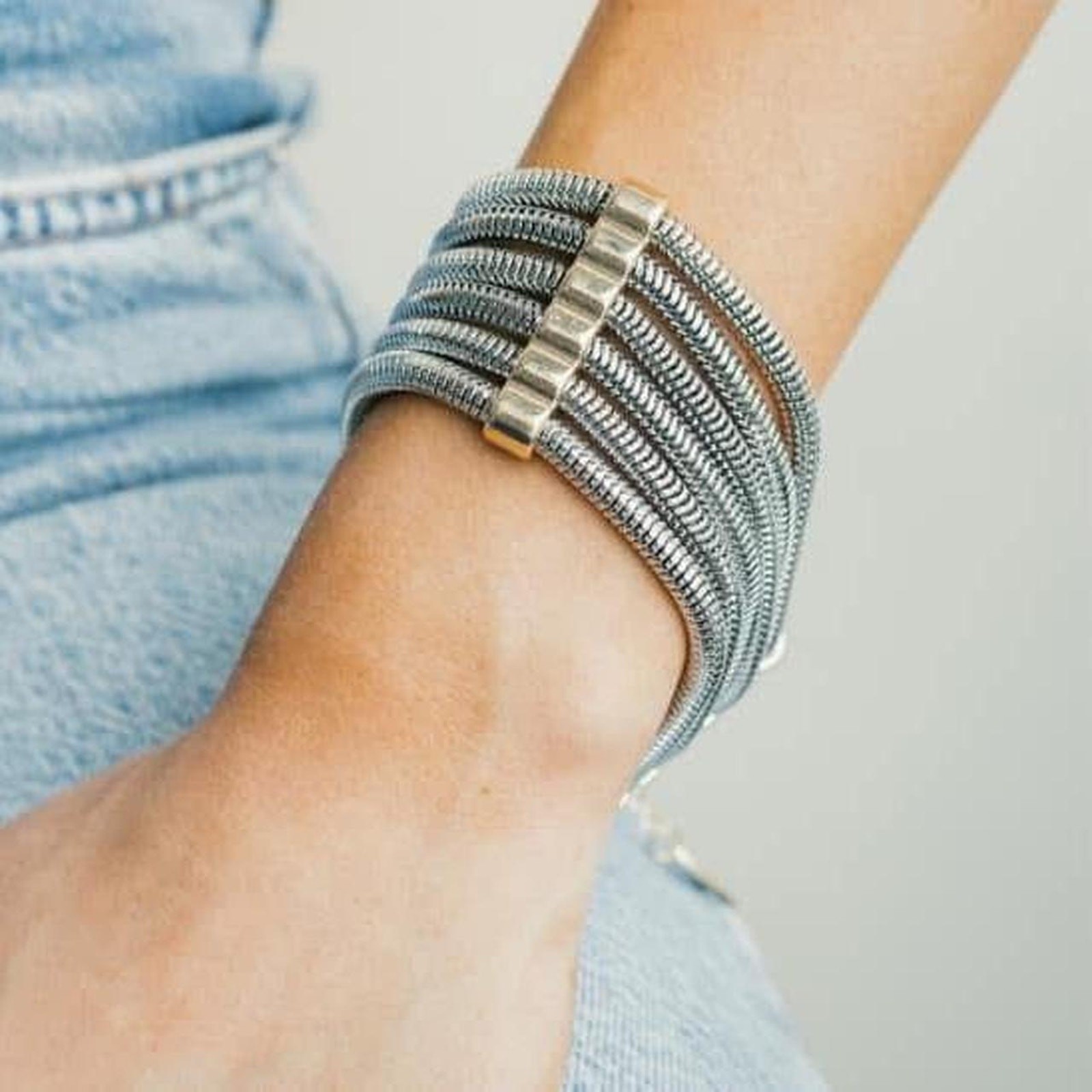 Silver and gold multi strand braclet gallery
